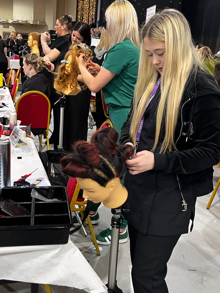 Picture of our students competing in the AHT Competition